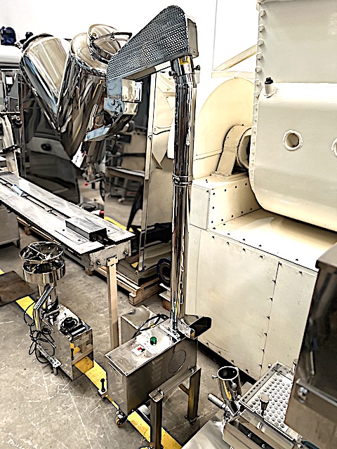 ELEVADOR DE CAPSULAS LLENAS ACERO INOXIDABLE USADOS